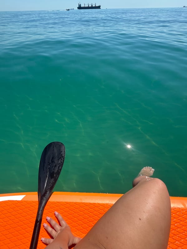 Paddleboarding on a calm turquoise Black Sea near Varna