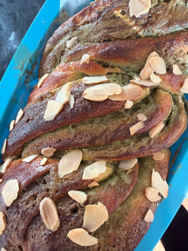 Green-tinged braided bread with almonds baked in Bretton
