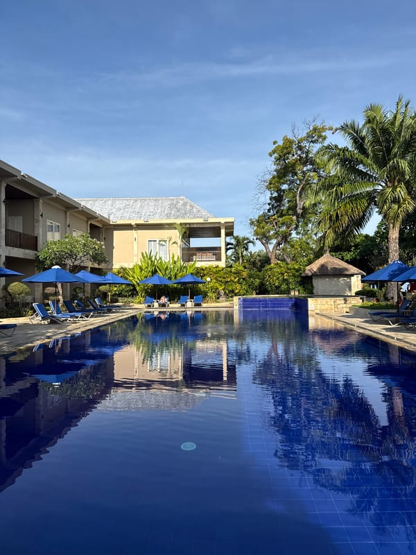 Resort pool and coastal fishing documented in Buleleng, Indonesia