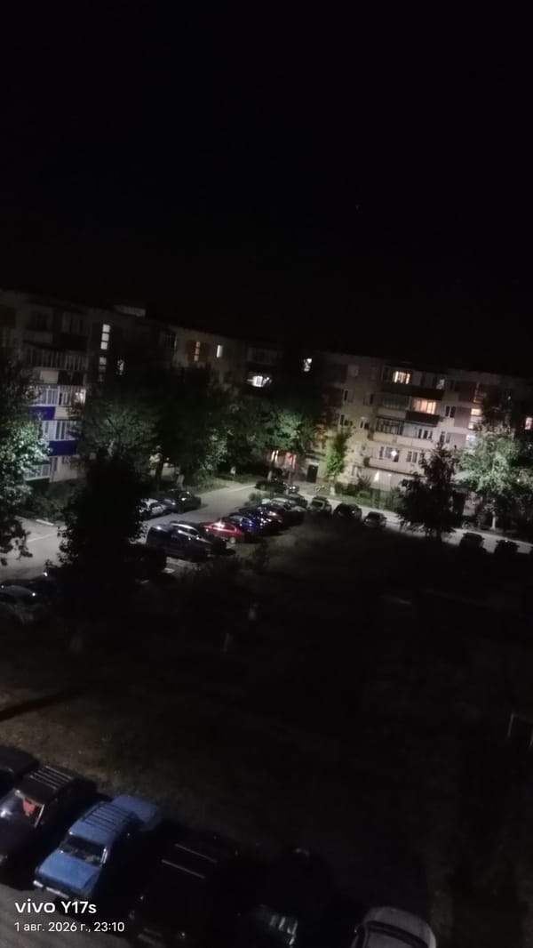 Butterfly decor and nighttime streets in Rudny, Kazakhstan