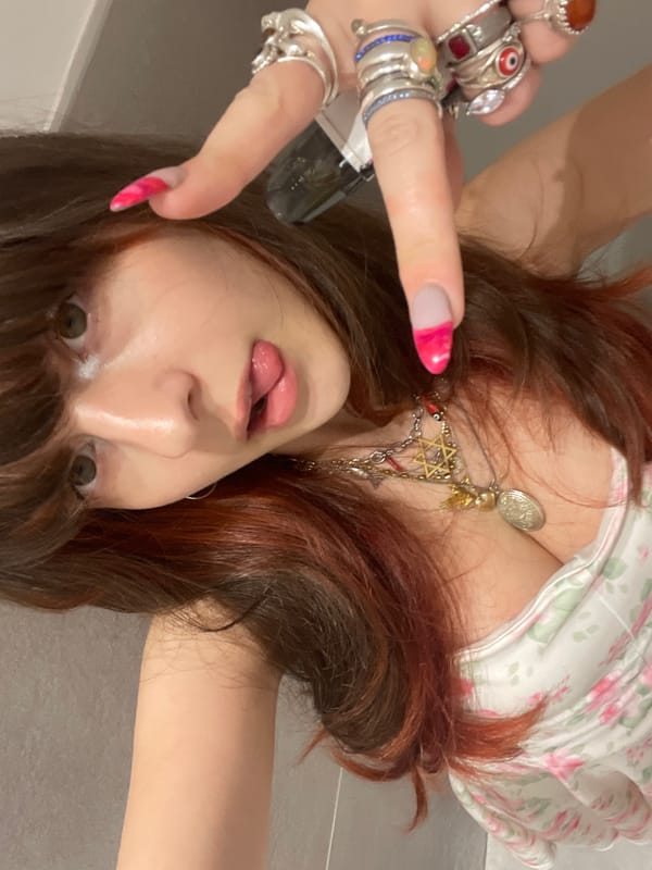 Woman dines and takes selfies at Raanana restaurant