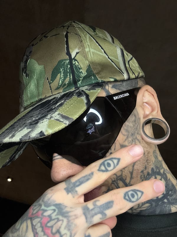 Tattooed Individual Recorded in Multiple Buenos Aires Street Videos