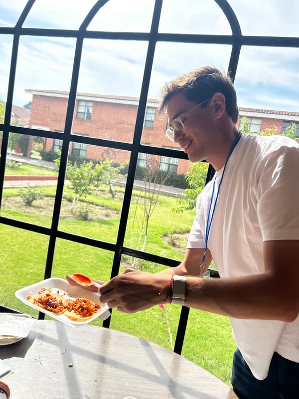 Man with tacos al pastor spotted near ornate brick building