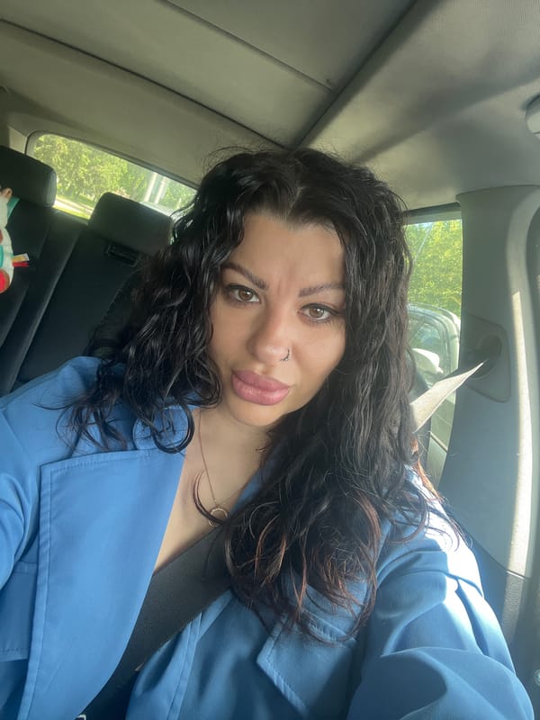 Woman photographed in car interior in Plovdiv, Bulgaria