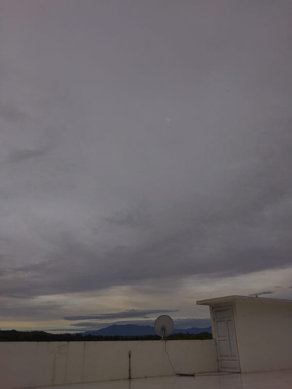 Evening sky observed over Bireuenmeunasahdayah, Indonesia cityscape