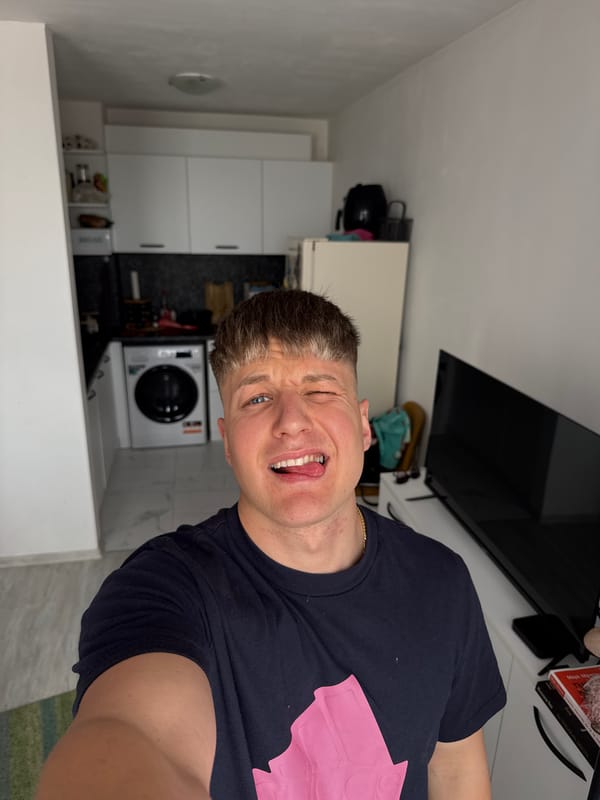 Man takes playful selfies in Plovdiv kitchen