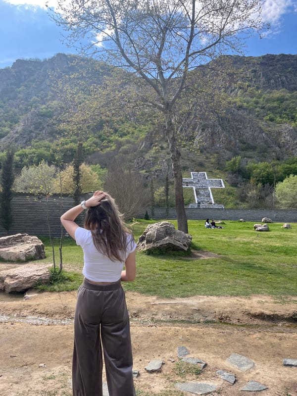 Woman visits turtle pond in Bulgarian village