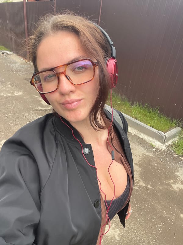 Woman takes playful selfies in Misaylovo residential area