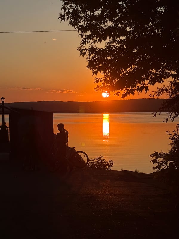 Sunset memories captured over water by multiple witnesses