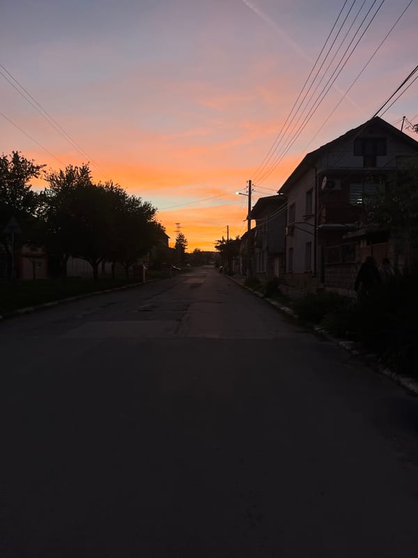 Colorful sunset captured on quiet street in Dibich, Bulgaria