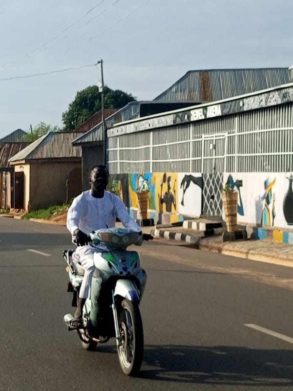 Everyday street movement through Gombe, Nigeria on a July afternoon