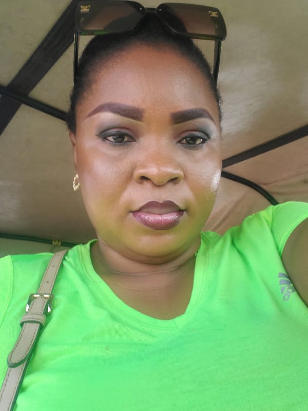 Portrait of smiling woman photographed in Lagos, Nigeria