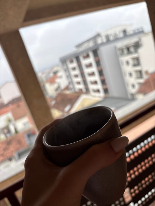 Morning coffee moment captured at window in Kragujevac