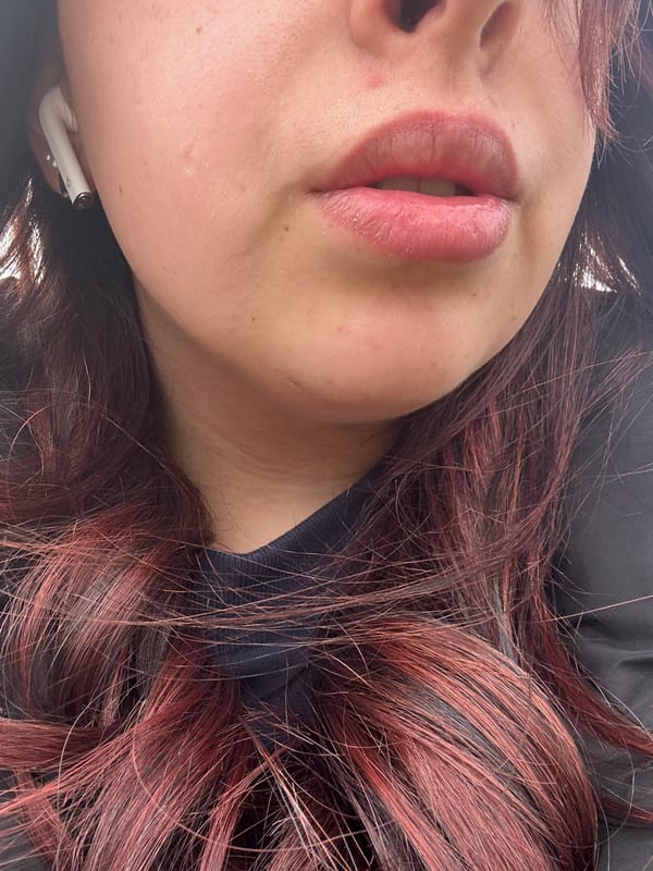Close-up portrait captured in Sofia shows person with earbuds