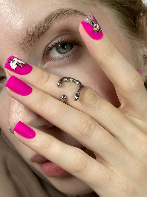 Pink nail art with cartoon designs spotted in Izhevsk