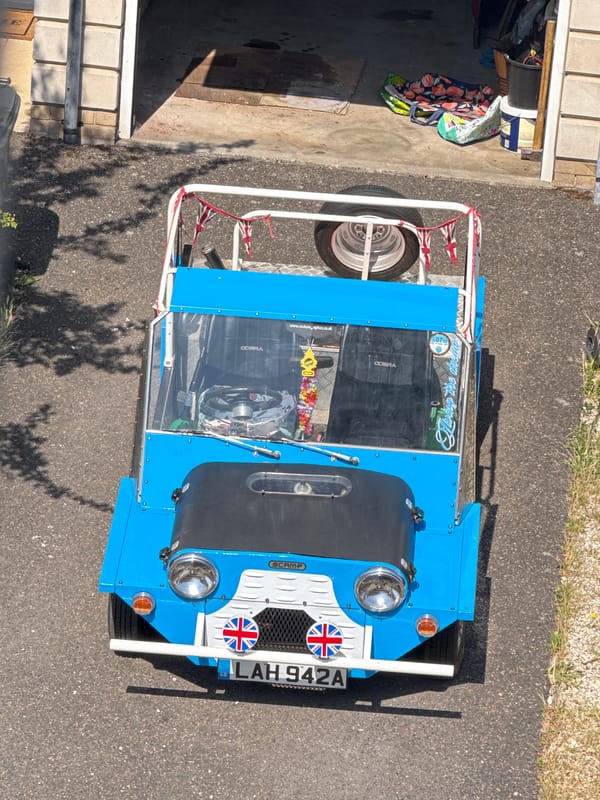 Lazy summer afternoon in Great Yarmouth, Moke parked nearby