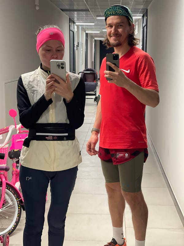 Two people take selfie in hallway, Izhevsk Russia