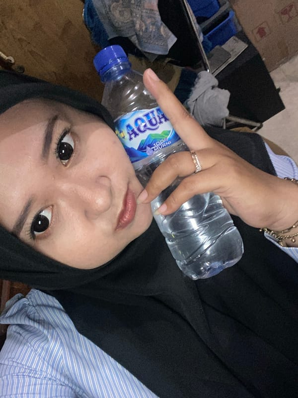 Late night indoor moments documented in Surabaya office setting