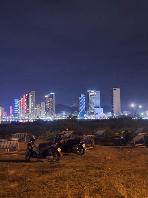Nha Trang waterfront at night, skyline and gate details