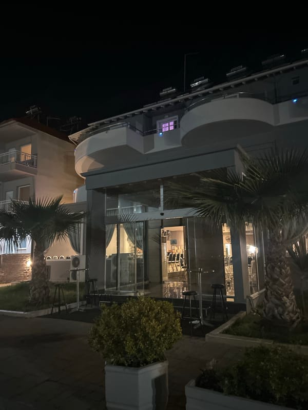 Young men photographed at hotel complex in Katerini, Greece