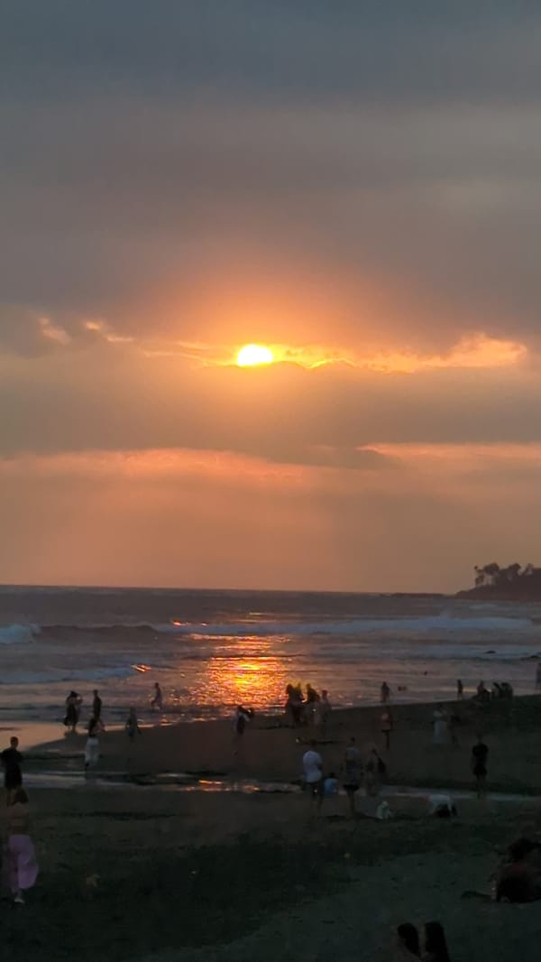 Beach games, street murals, and a sunset along Bali's coast