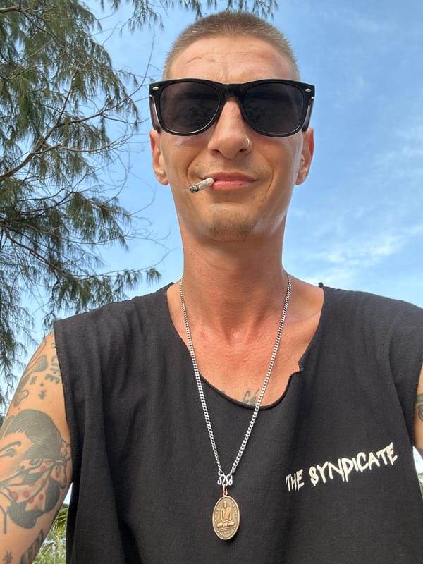 Lazy morning on Karon Beach — sunsets, smoke, and a metal detector