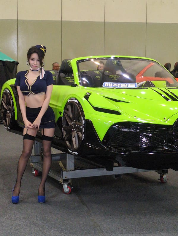 Flight attendant uniform spotted near vehicle in Busan