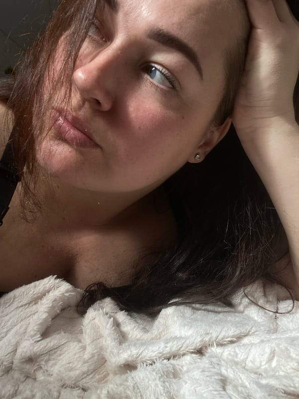 Toddler with blue treat, resting person documented in Sochi