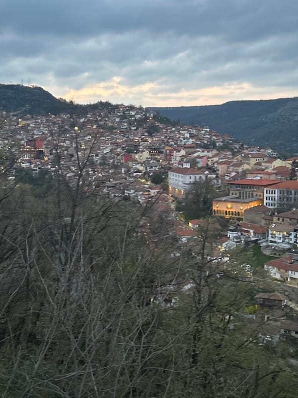 Tourist documents scenic views of historic Veliko Tarnovo, Bulgaria