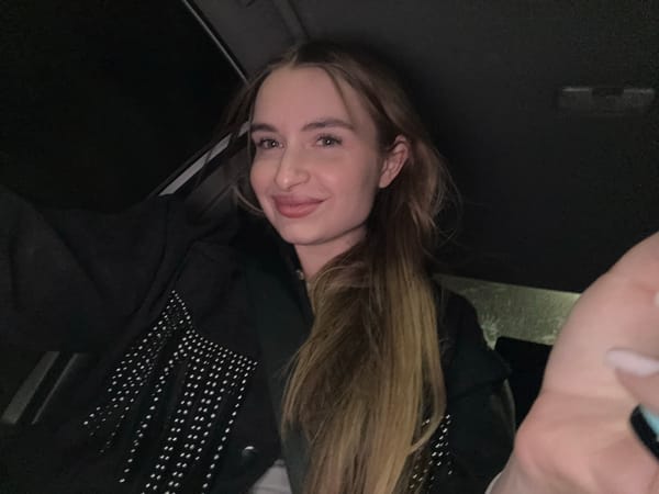 Woman photographed upside down indoors in Budva, Montenegro