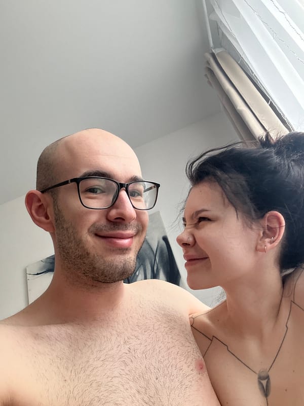Two people pose for camera in Lyubertsy, Russia