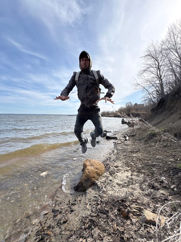 Two people photographed along waterfront in Ulyanovsk, Russia