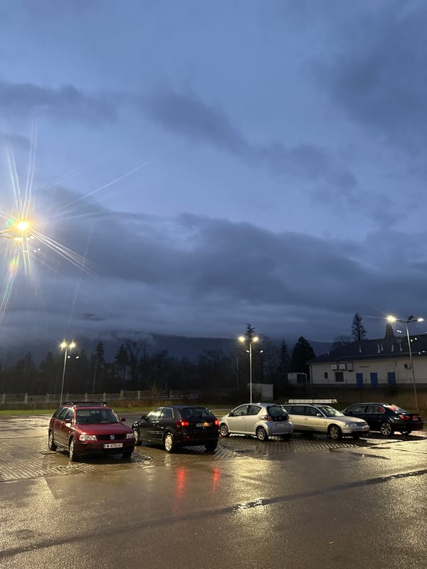 Wet street scene captured during overcast evening in Berkovitsa