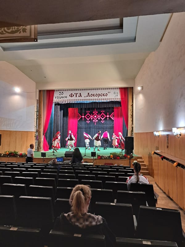 Traditional Bulgarian folk performance draws costumed audience in Lokorsko