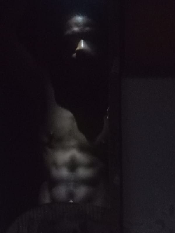 Person observed in darkened interior space in Nkpor