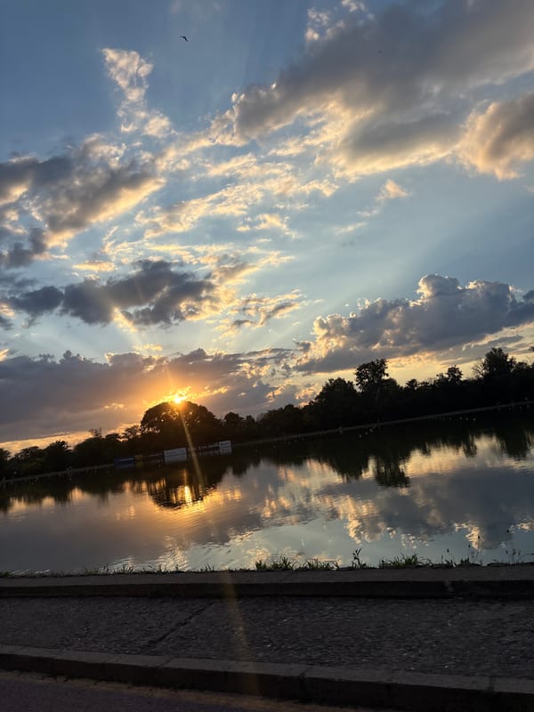 Golden sunset reflects over Plovdiv's riverside in late June
