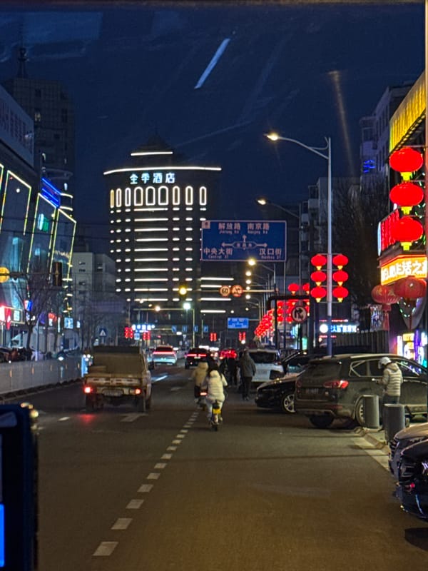 Night view captured of illuminated Ji Hotel in Linghe