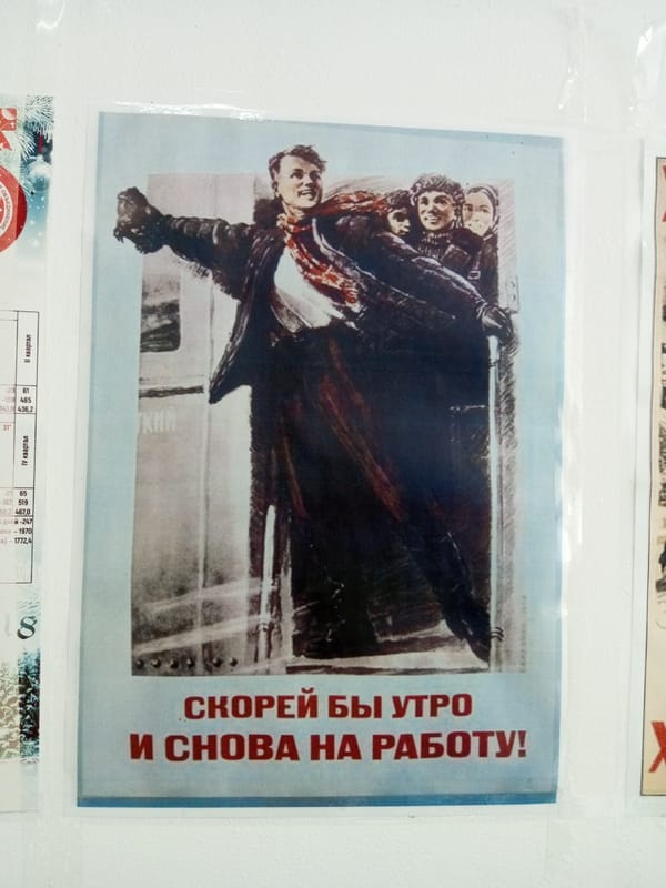 Soviet poster, snowy courtyards documented in Cheboksary, Russia