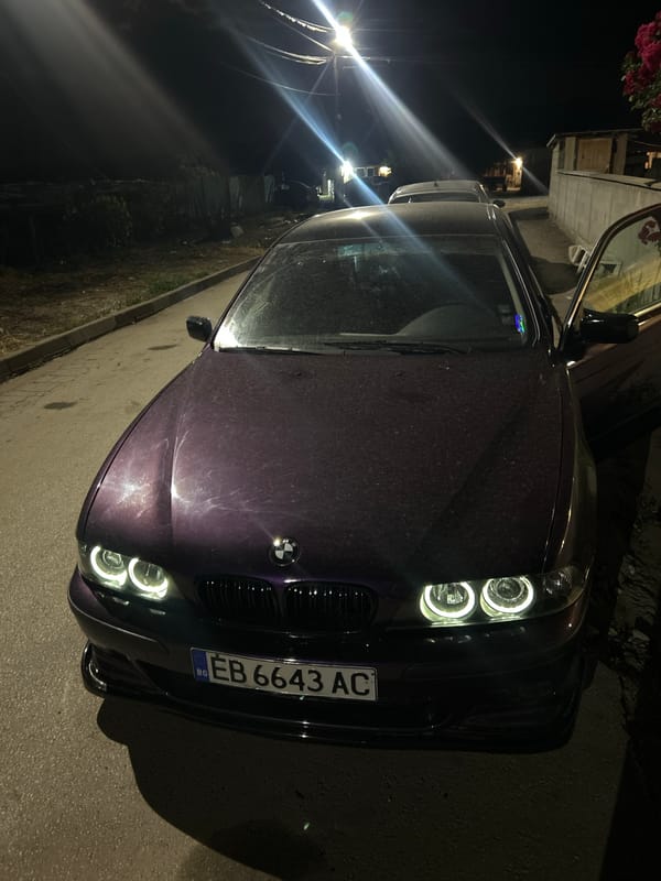 Purple BMW spotted with door open on Kochevo street