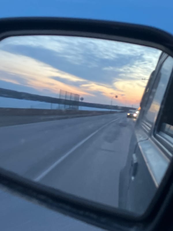 Sunset scenes captured from highway and snowy field near Noviy