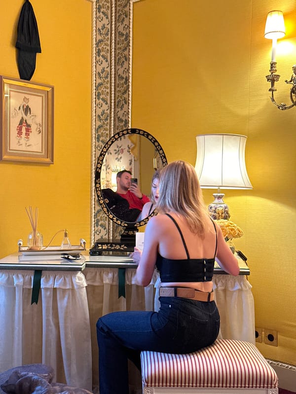 Professional photoshoot filmed behind-the-scenes in ornate London room