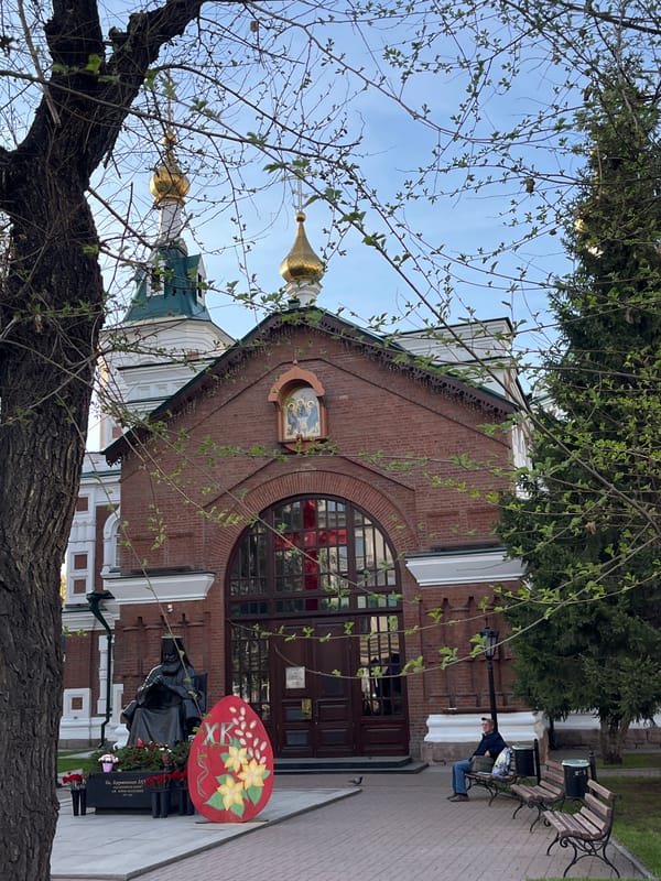 Urban scenes documented: church, reflection, buildings in neighborhood