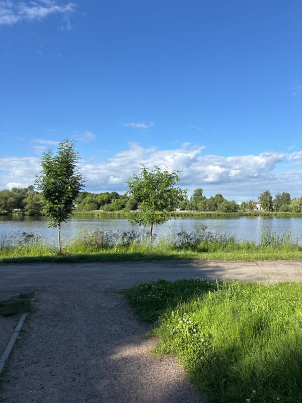 Sunny afternoon along Minsk's waterfront and surrounding neighborhood