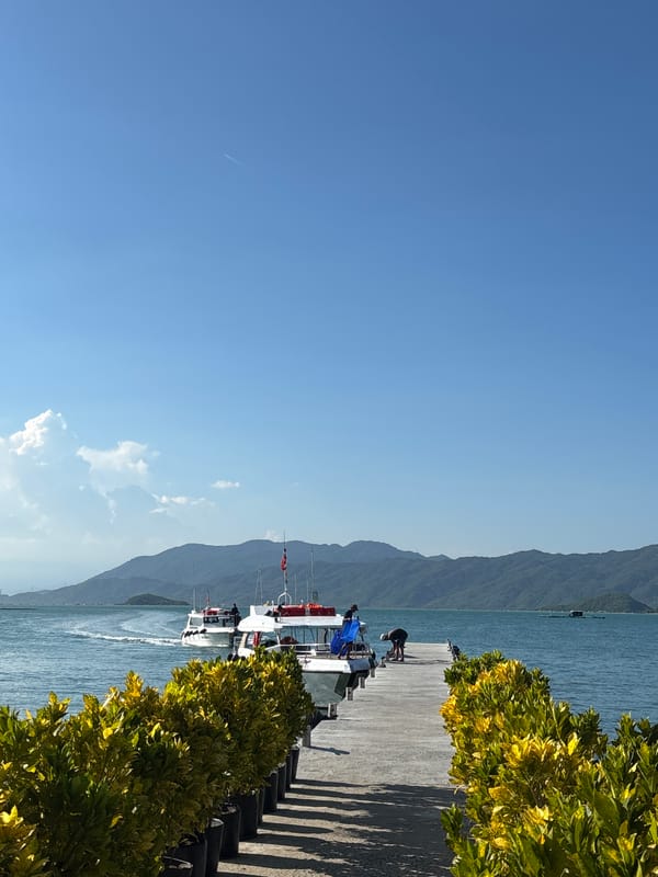 Quiet morning at a beachside pier in Vĩnh Lương, Vietnam