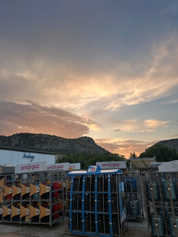 Sunset over a Super U and gas depot in Anduze