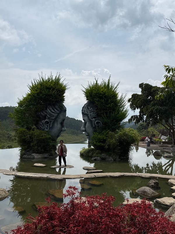 Stone busts spotted in Da Lat garden scene
