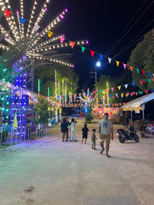 Night festival with concert, market stalls in Ban Tai Thailand