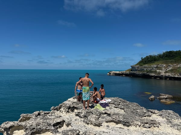 Young men enjoy cliff jumping, swimming at Tsarevo coastline