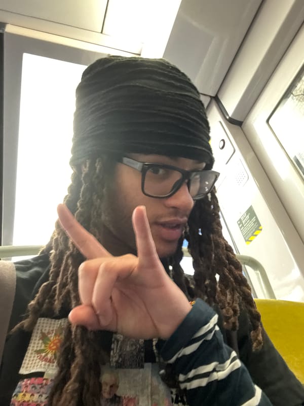 Person takes selfie on public transport in Massy