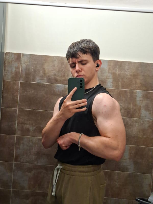 Young man takes mirror selfies indoors in Plovdiv